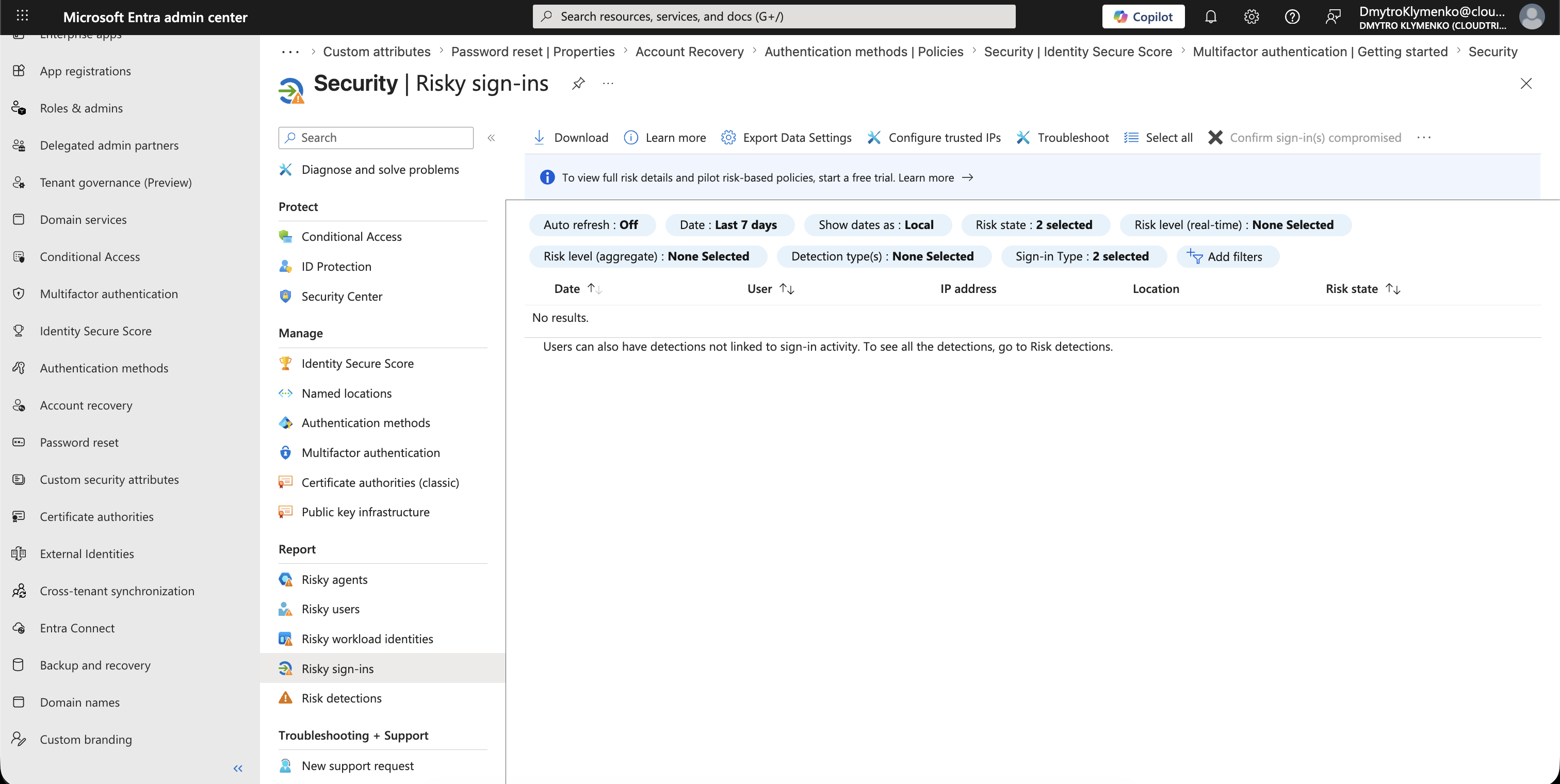 Microsoft Entra Identity Secure Score risky sign-ins list showing date, user, IP address, location, and risk state