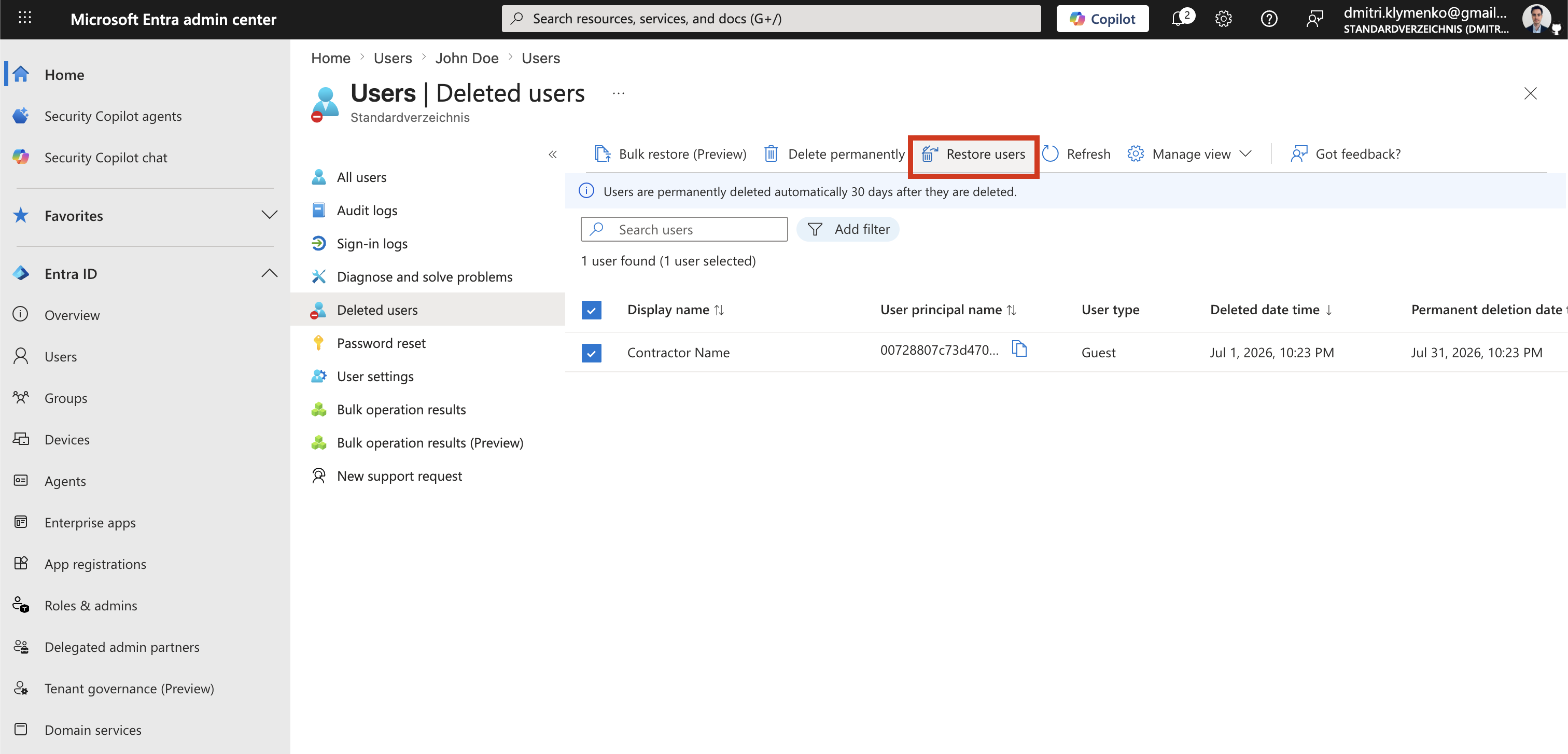 Microsoft Entra Deleted users page showing the Restore user action button